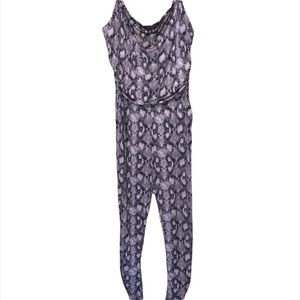 Beautiful snakeskin romper NWOT m/l
